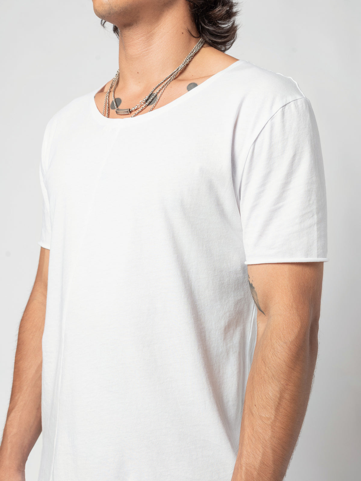 AITO Scoop Neck Cotton T-Shirt in White — close on the chest and both short sleeves, the hem out of frame below