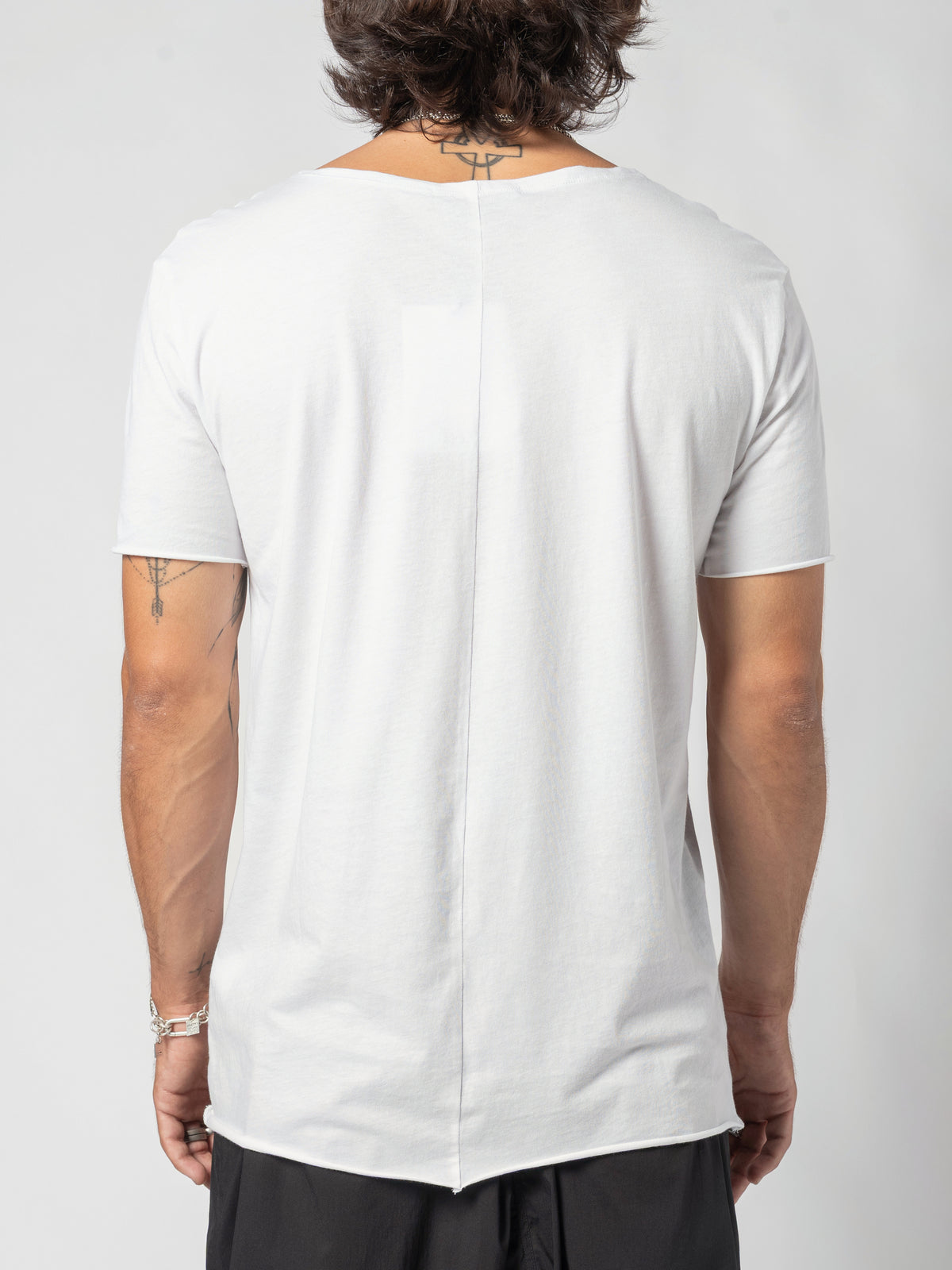 AITO Scoop Neck Cotton T-Shirt in White — back view stepped further out, the full width of the back and the dipped hem in frame