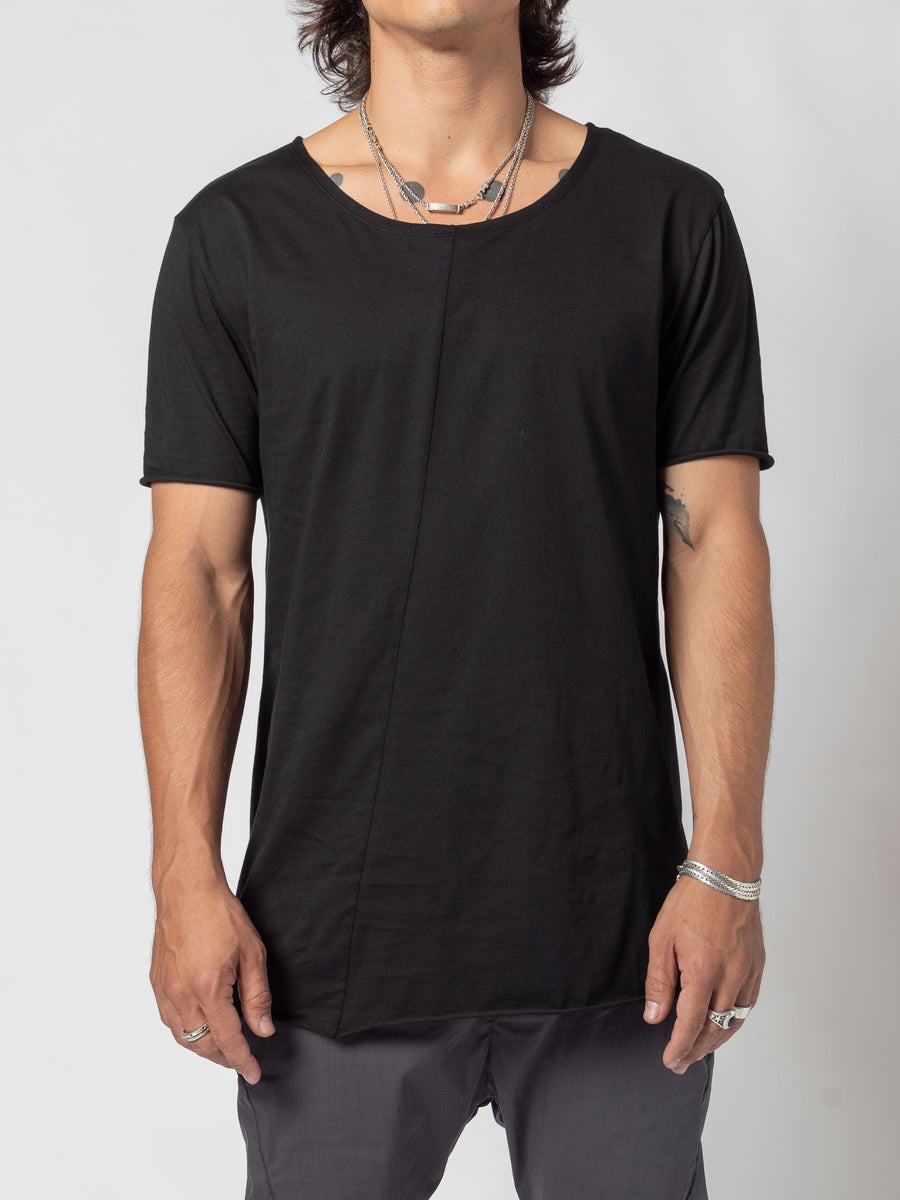 AITO Scoop Neck Cotton T-Shirt in Black — front view of the torso, arms at his sides, the wide neckline and the centre-front seam running down to the hem