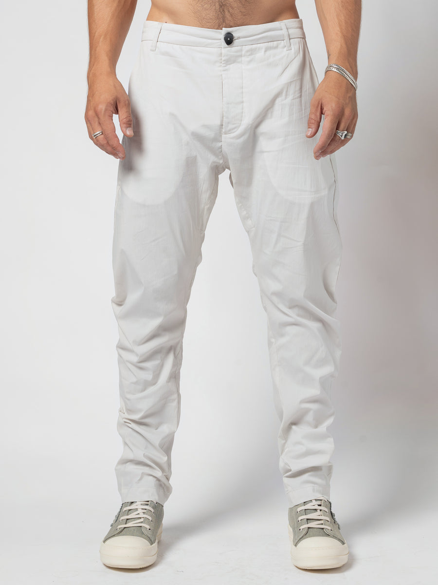 AITO Low-Rise Slim Pants in Off White — front view from the waistband down, arms at the sides, feet close together