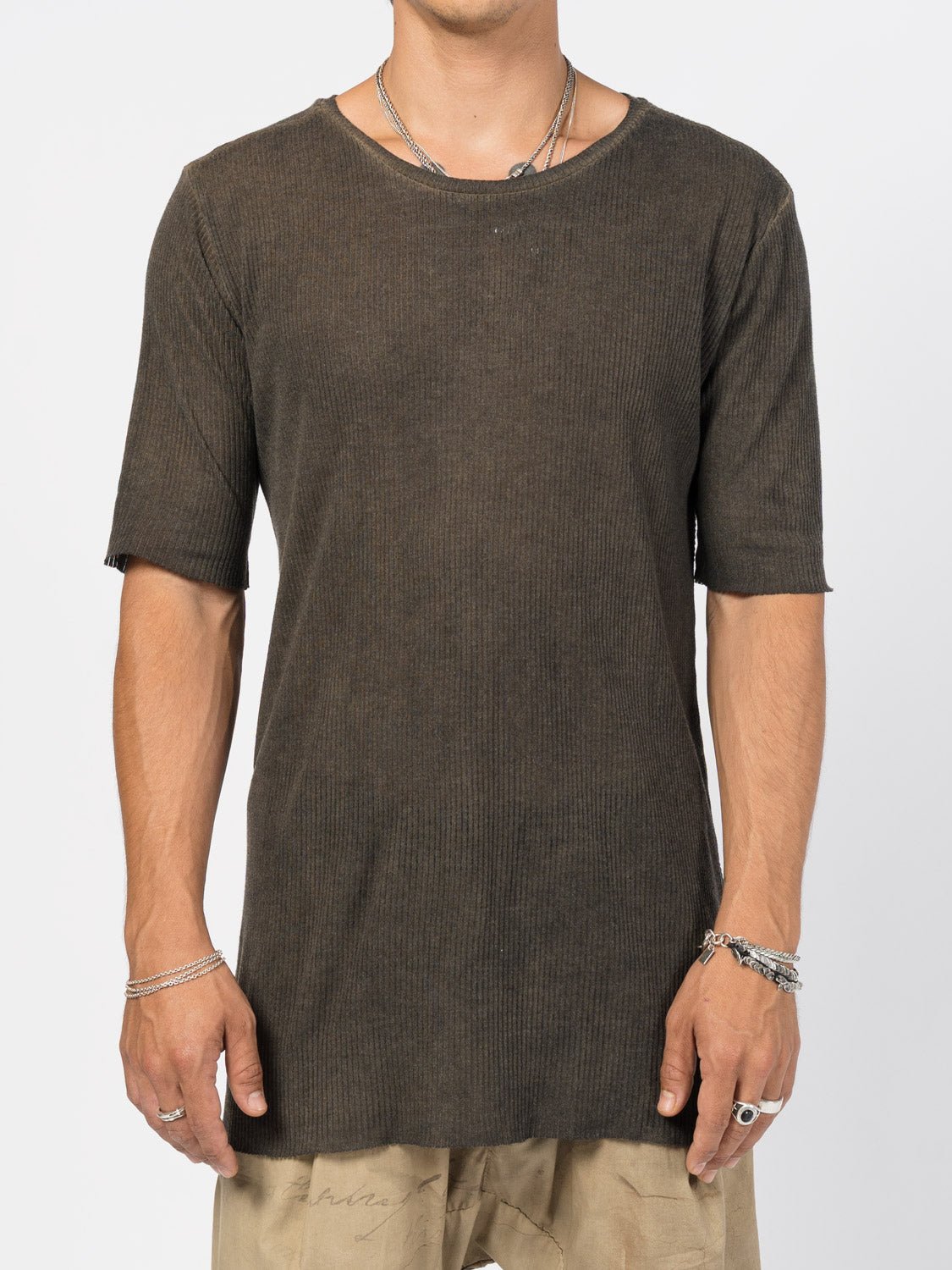 AITO Ribbed Cotton T-Shirt in Charcoal — front view on the model, raw scooped crew neck and fine vertical rib across the chest.
