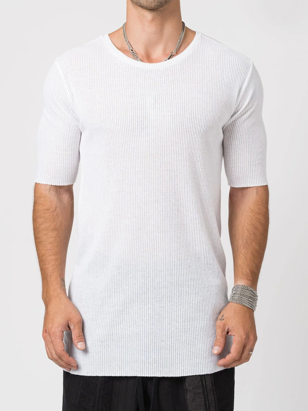 AITO Ribbed Cotton T-Shirt in White — front view on model, vertical rib and raw-cut crew neckline