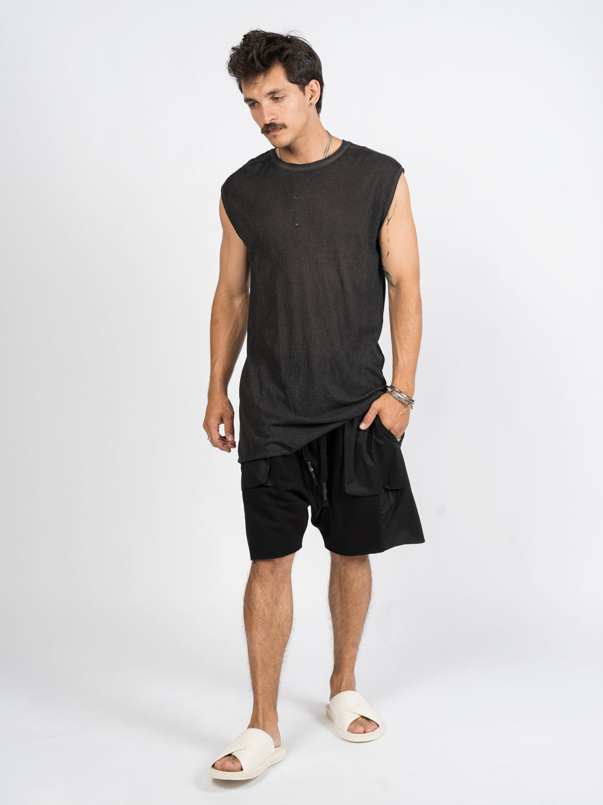 AITO Ribbed Tank Top in Militare — full-length front on model, longline hem falling past the hip