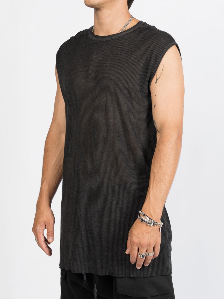 AITO Ribbed Tank Top in Militare — three-quarter side view showing the wide low armhole and longline drape