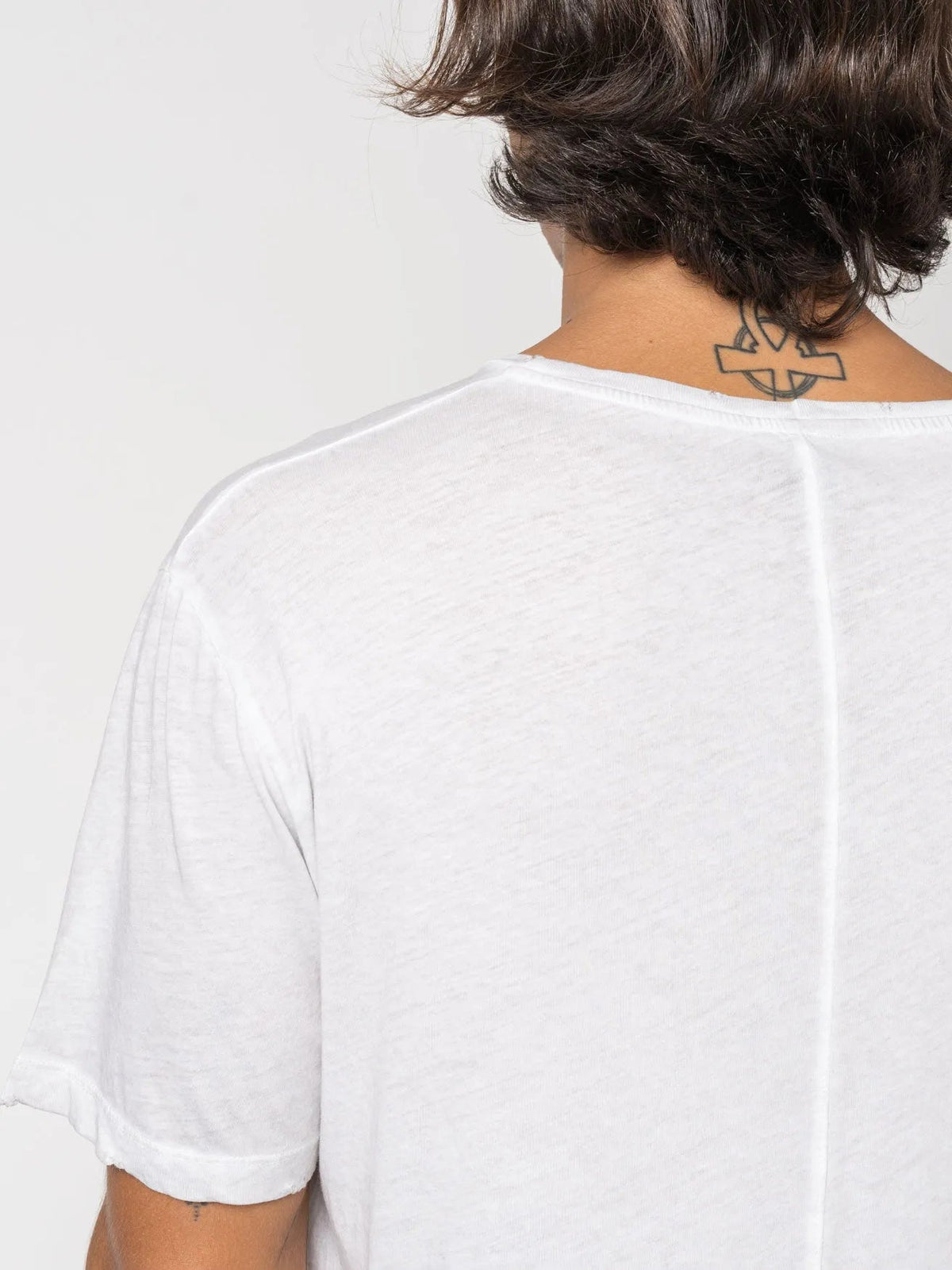 AITO Vintage Washed Cotton T-Shirt in Stone — close detail of the upper back, showing the raw neckline finish and slub fabric texture