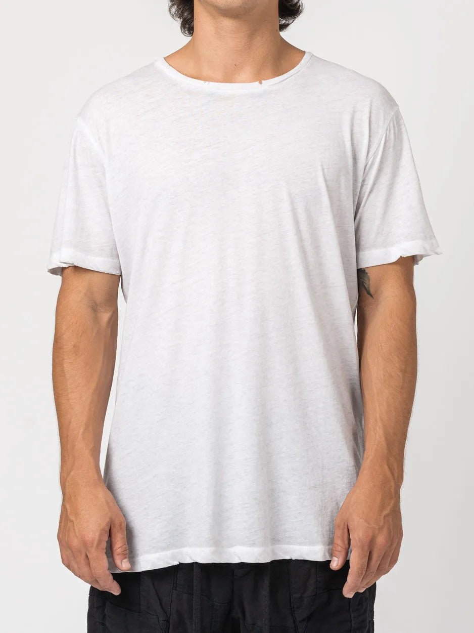 AITO Vintage Washed Cotton T-Shirt in Stone — front view on model, showing the raw crew neckline and pale washed slub jersey