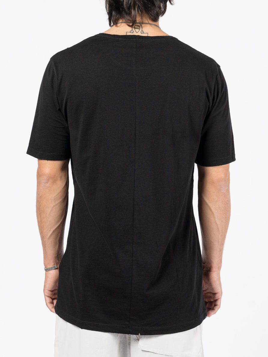 AITO Washed Cotton T-Shirt in Black — back view on model, showing the full-length centre-back seam and curved hem